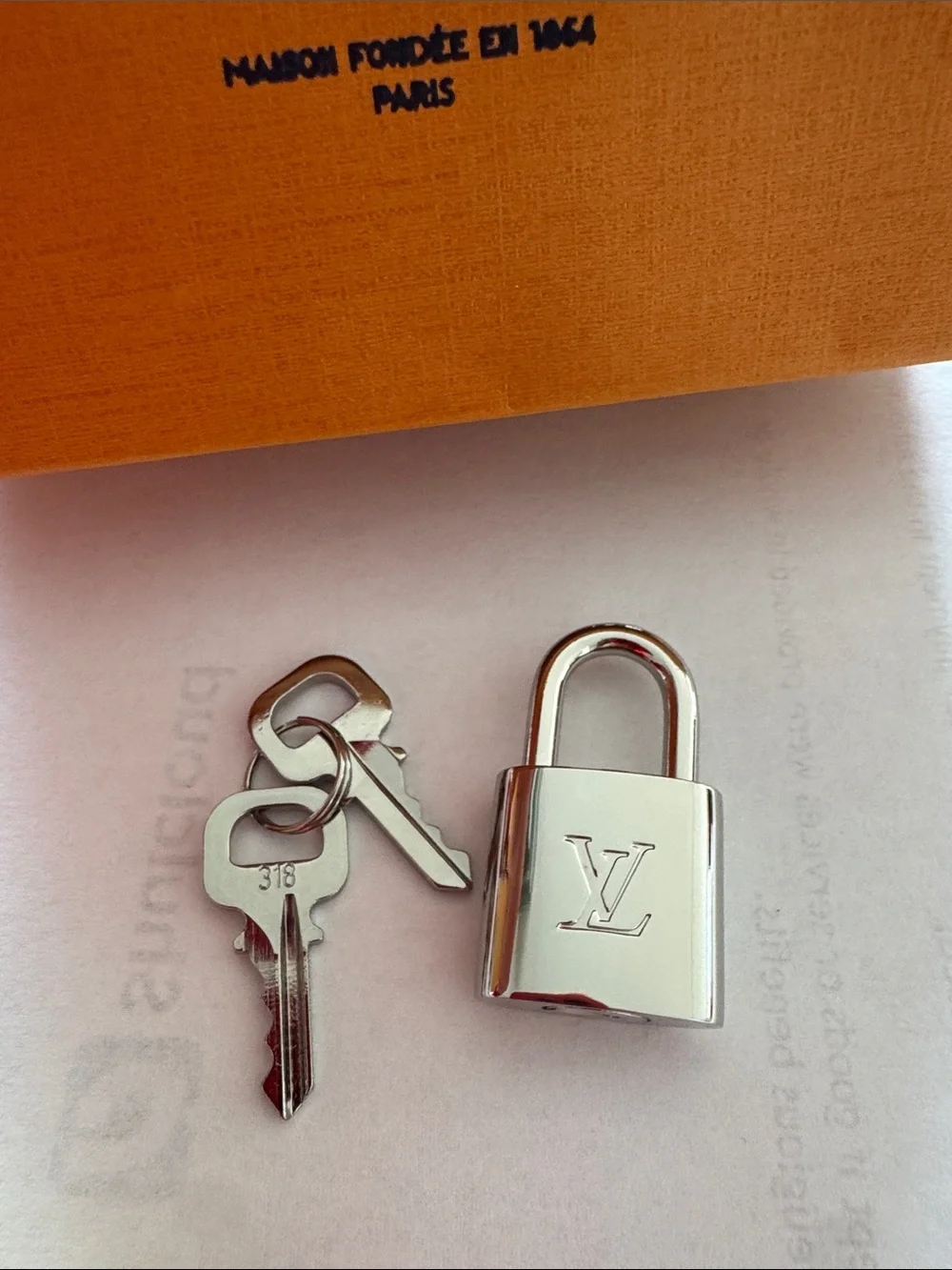 Louis Vuitton Silver Padlock and Key Set